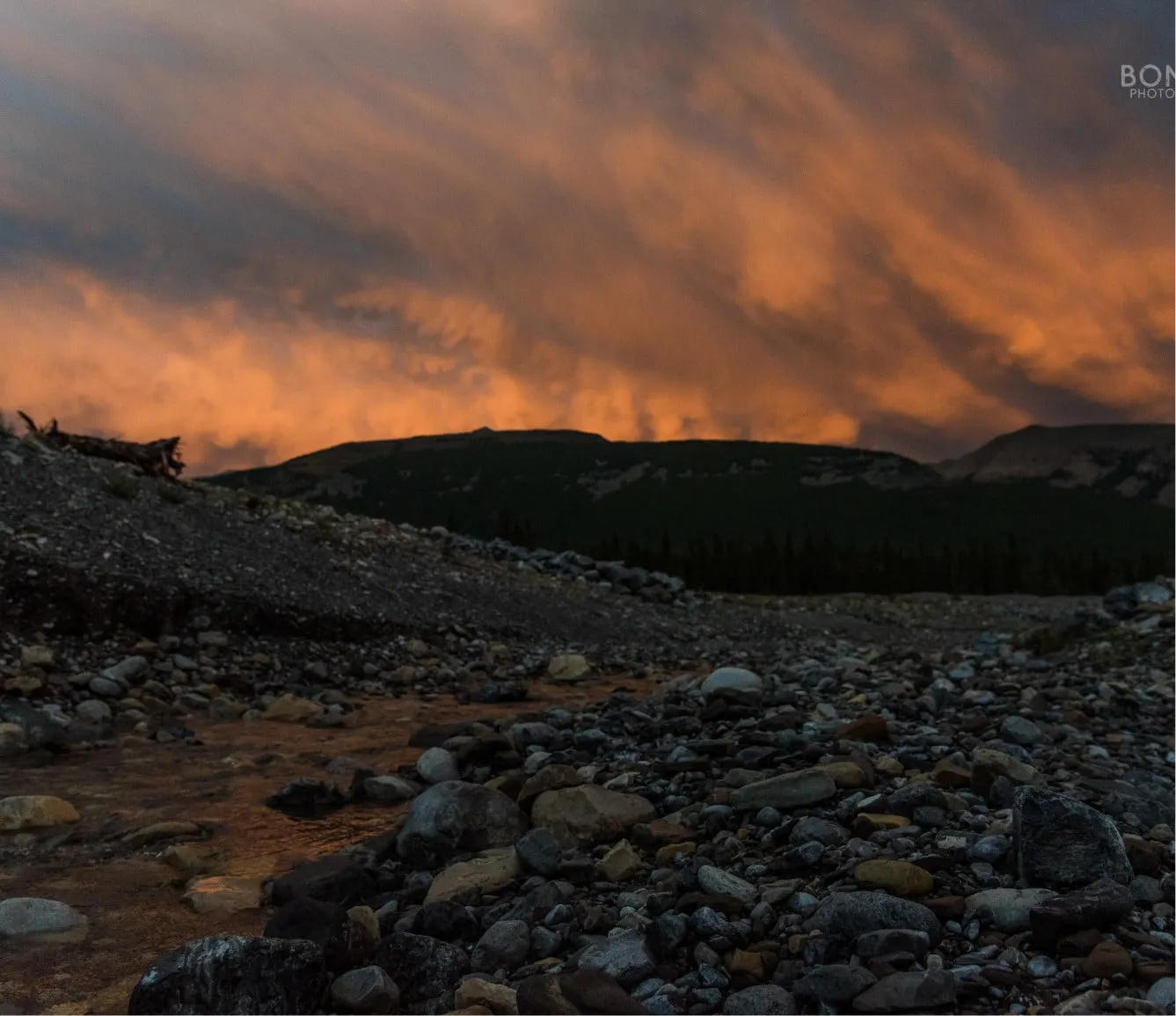 the silhouette of the mountains at sunset